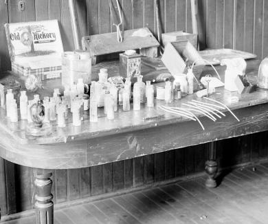  Image of a table containing cocaine, opium, and morphine taken from “dope fiends” in Chicago, Illinois, 1908. Photo by Chicago Sun-Times/Chicago Daily News collection/Chicago History Museum/Getty
