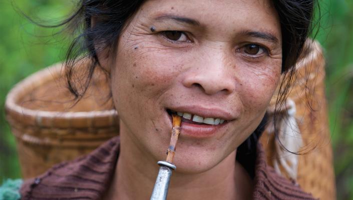 Rural Laotian women smoking