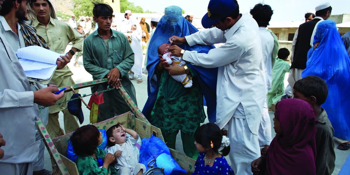 Field doctors attend to children in a crisis situation