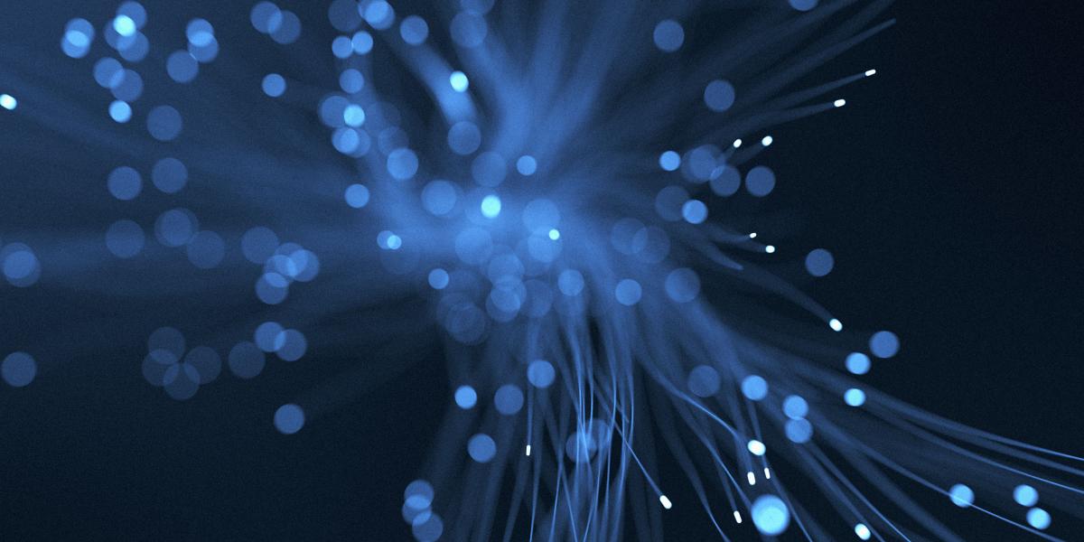 blue background pattern resembling fiber-optic cables