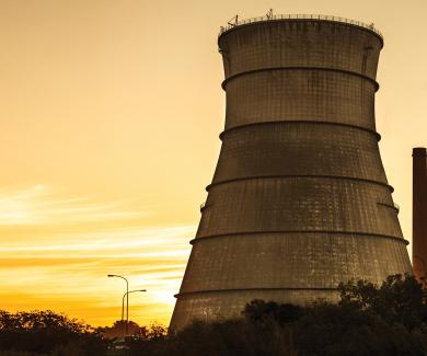 a nuclear reactor at sunset