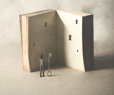 Illustration of woman with a key standing in front of an open book with keyholes